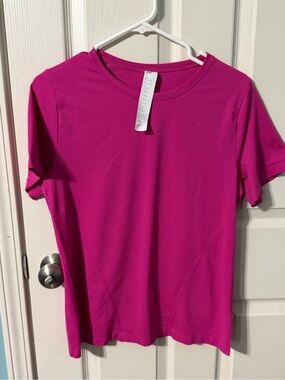Fabletics Women’s Feather Tech Pink Shirt Excellent Condition Size Medium.